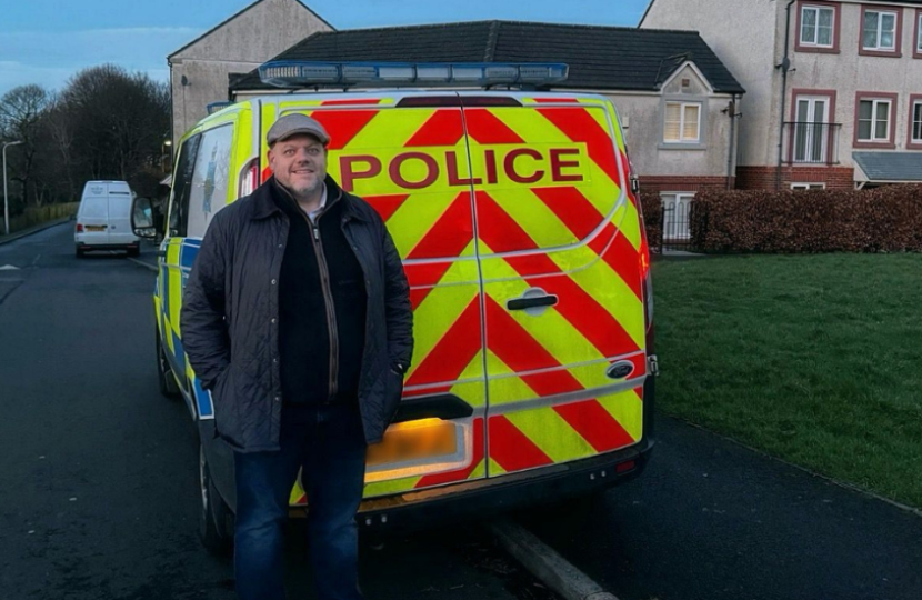 Mark with police van